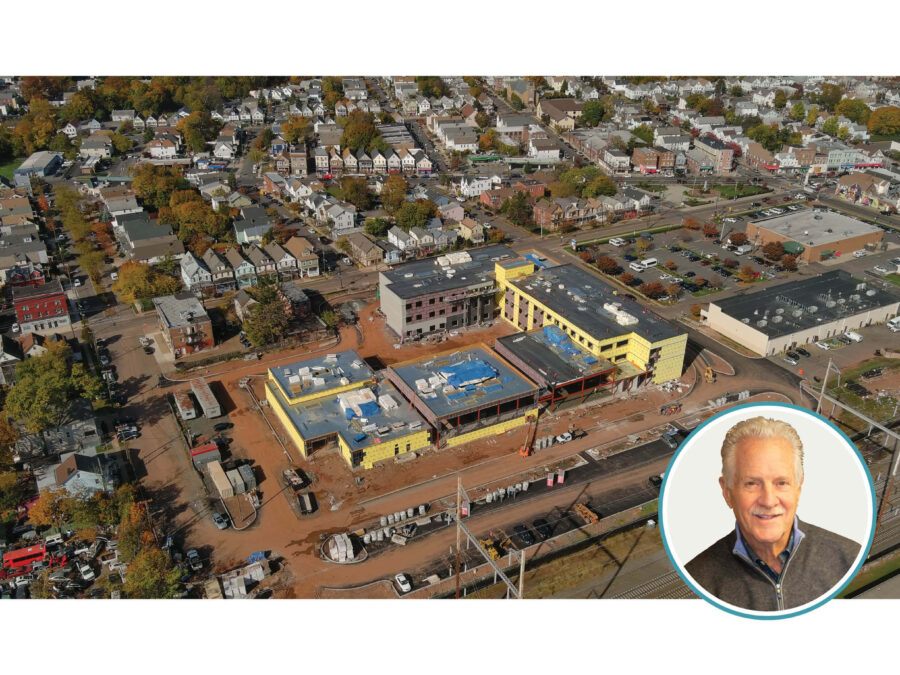 A drone view of a building under construction and the author's photo.