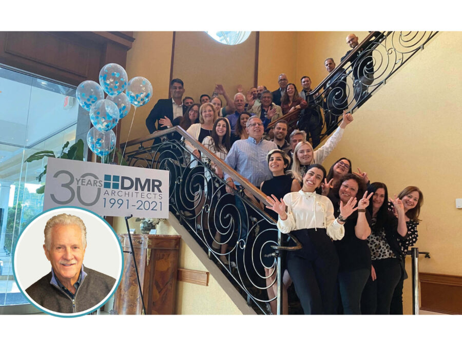 Employees pose for a photo at a party and the author's photo.