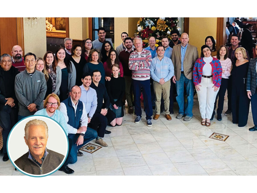 Employees posing for a photo during the holiday party and the author's photo.