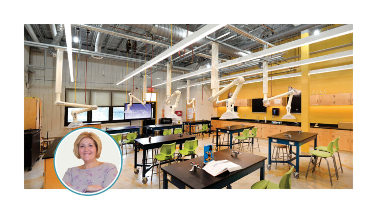 A science lab, with utilities hung from an opening ceiling, and the author's photo.