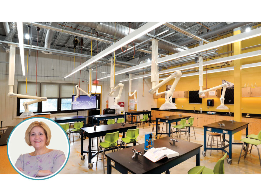 A science lab, with utilities hung from an opening ceiling, and the author's photo.