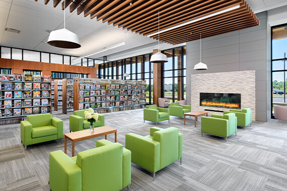 The center of the Montgomery branch of the Somerset County Library System includes soft furniture and a fire feature, as well as heavy timber hung from a ceiling, a nod to the township's agricultural history and contemporary style.